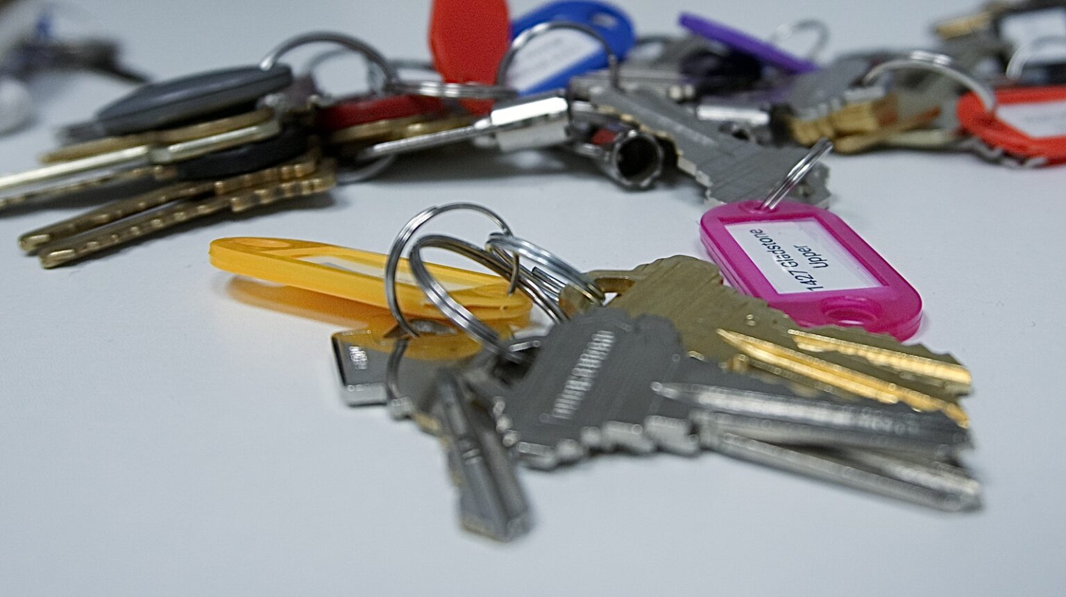 Set of house keys symbolizing secure tenant placement and smart property management strategies that maximize ROI."